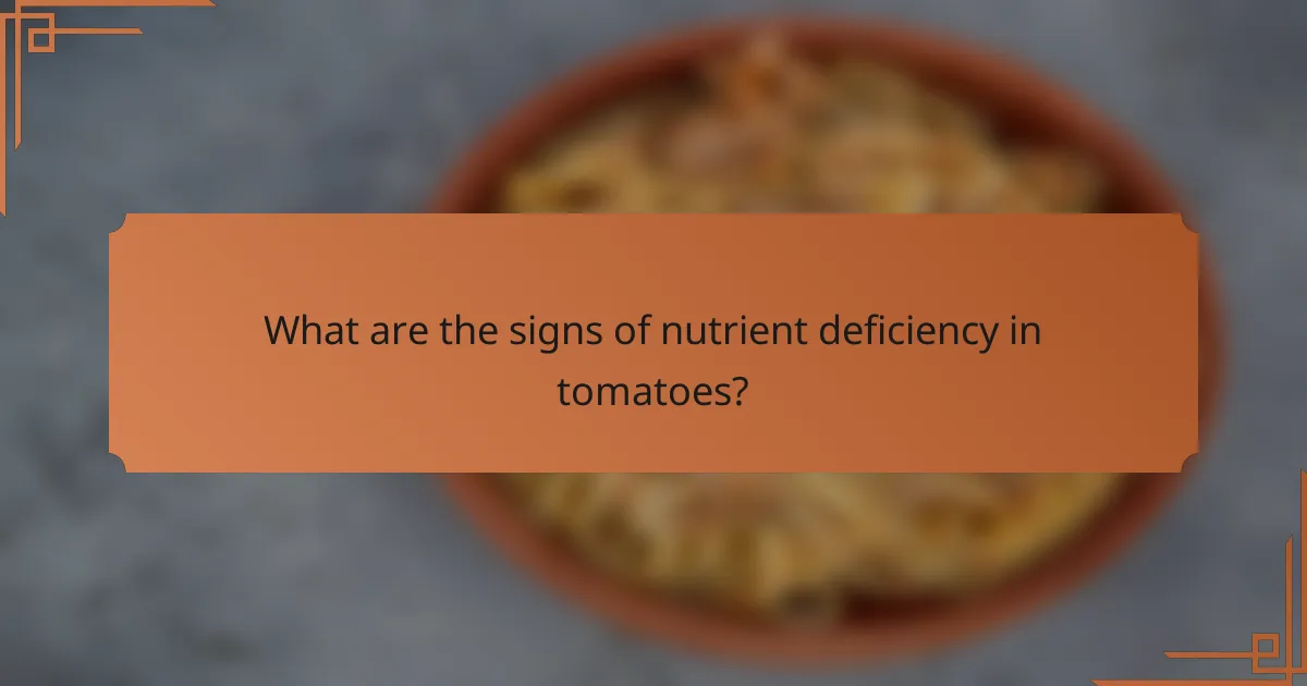 What are the signs of nutrient deficiency in tomatoes?